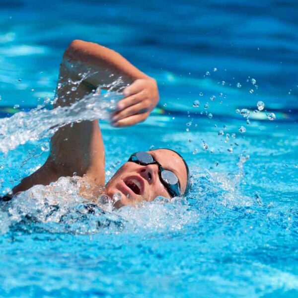 Adult swimmer practising freestyle technique during a Swimlab coaching session in Sydney