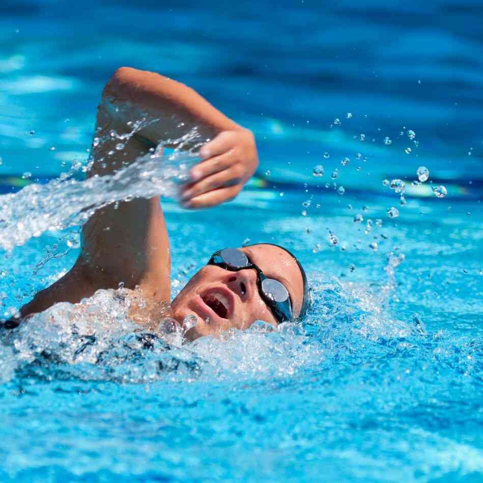 Adult swimmer practising freestyle technique during a Swimlab coaching session in Sydney